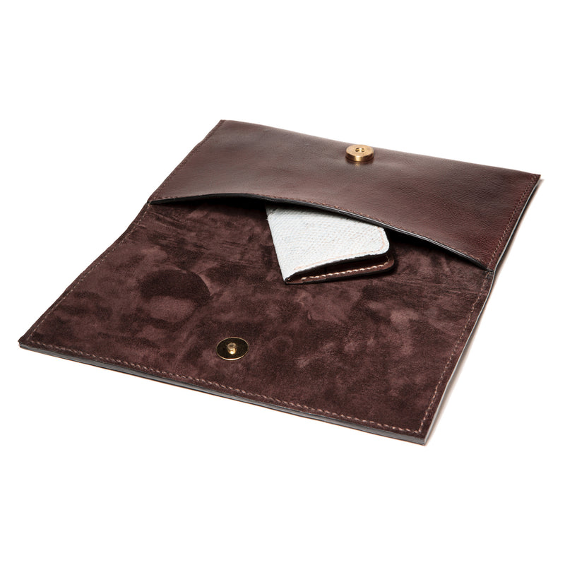 Brown evening leather clutch with wolffish fishleather